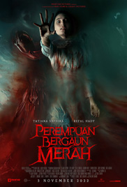 Perempuan Bergaun Merah